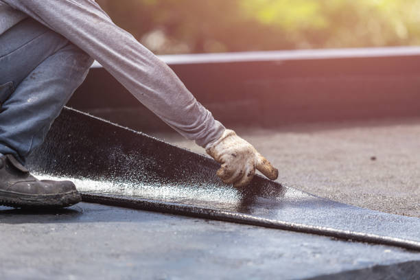 Professional Basement Waterproofing technician working in Tunnelton, IN